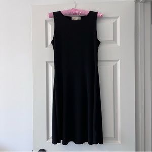 Michael Kors casual black dress, fun design in back, size M, new.